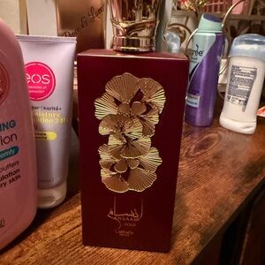 Lattafa Ansam Gold Perfume for Women - Elegant Gold and Red